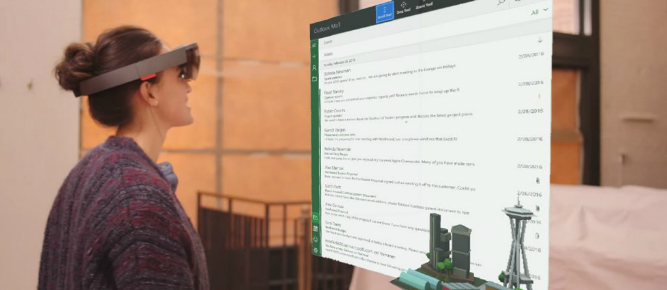 Woman using Microsoft HoloLens with Outlook Email